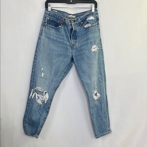 Distressed Blue Jeans wedgie fit levi red tabs with holes taper leg denim